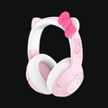 Pink and white headphones with a bow on a black background
